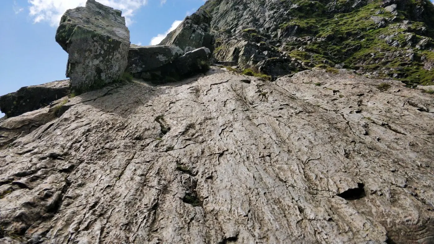 Scrambling up Sharp Edge
