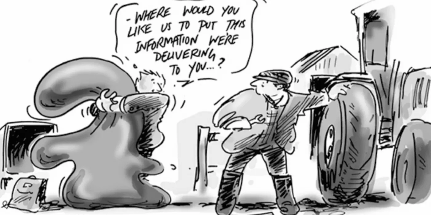The image shows a cartoon of two characters in a rural setting, likely a farm. On the left, someone is heaving an amorphous package out of a van. A speech bubble reads, 'Where would you like us to put this information we're delivering to you...?' On the right, a farmer stands leaning on a fence, looking perplexed by the question, with a large tractor behind him. The image comically represents the concept of delivering information in a non-digital, traditional context.